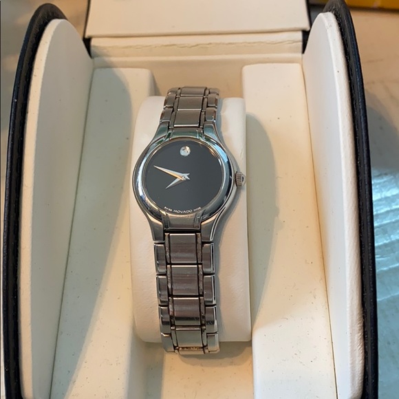Movado Accessories - Women’s Movado watch in classic Silvertone & black face 100% Authentic